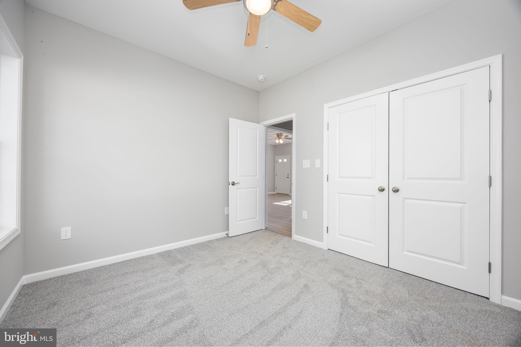 11779 St Stephens Way Princess Anne, MD 21853 - Photo 32 of 51 wooden floor in an empty room