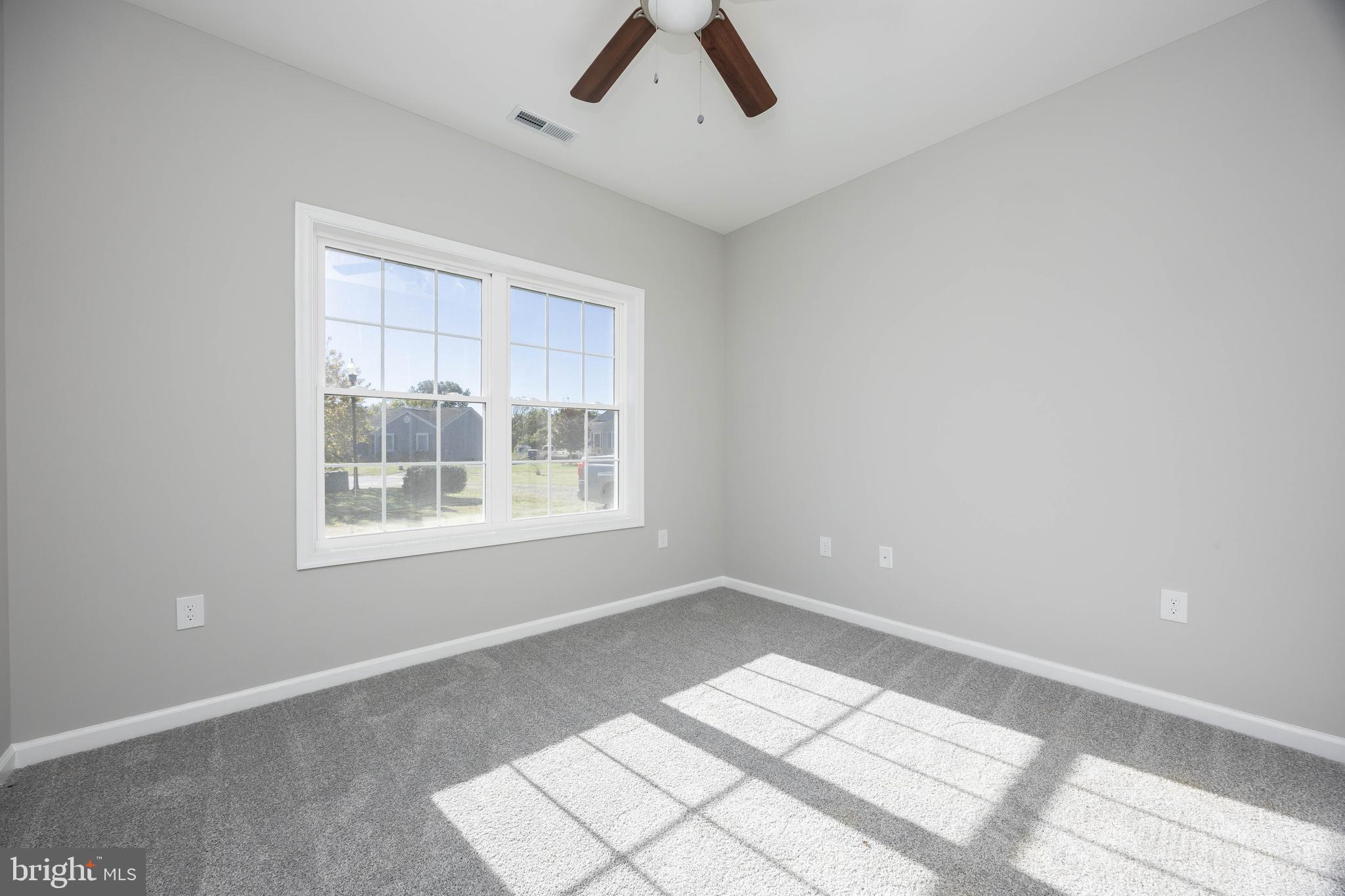11779 St Stephens Way Princess Anne, MD 21853 - Photo 39 of 51 a view of an empty room with a window