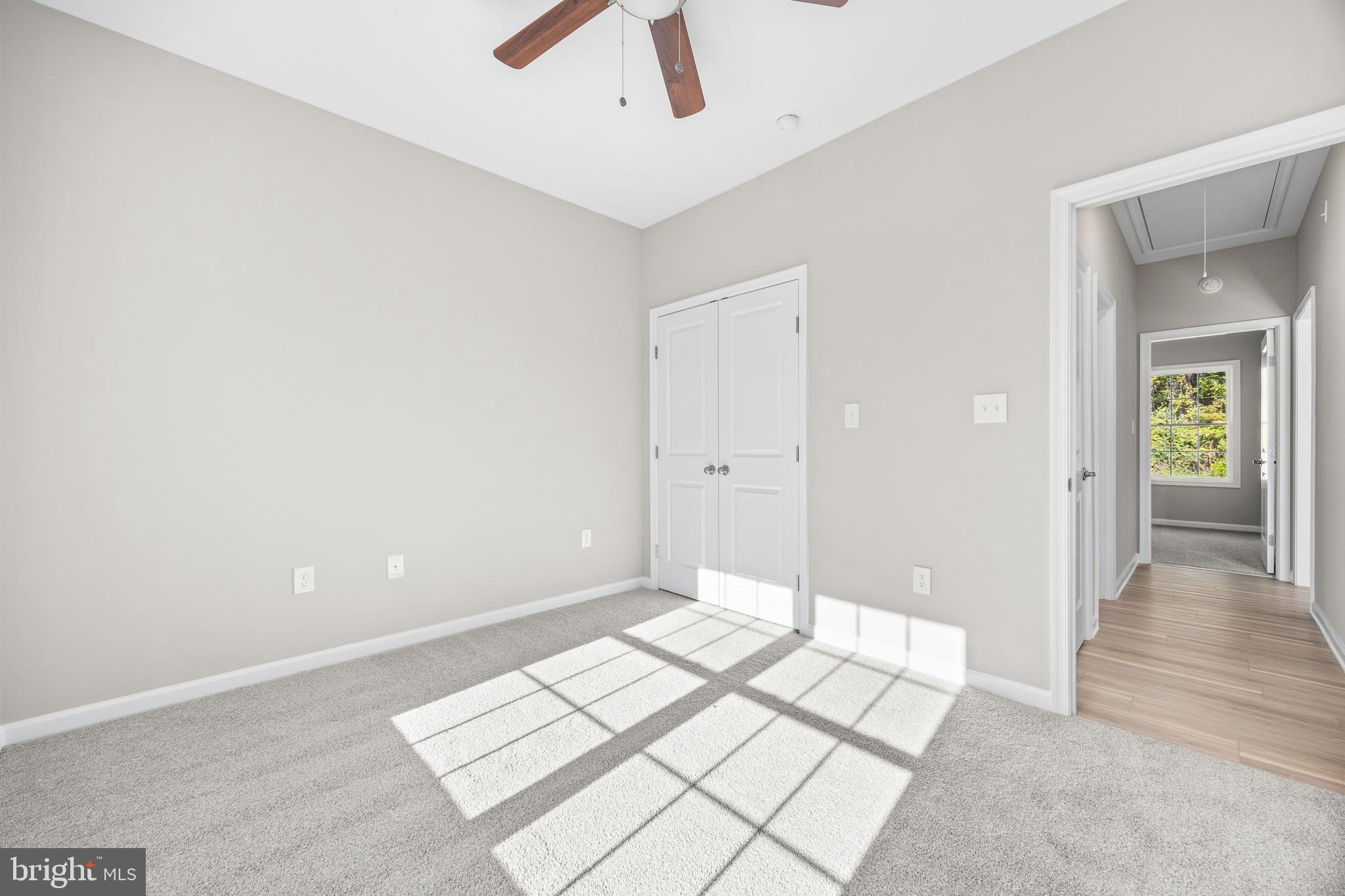 11779 St Stephens Way Princess Anne, MD 21853 - Photo 42 of 51 a view of a bedroom with wooden floor