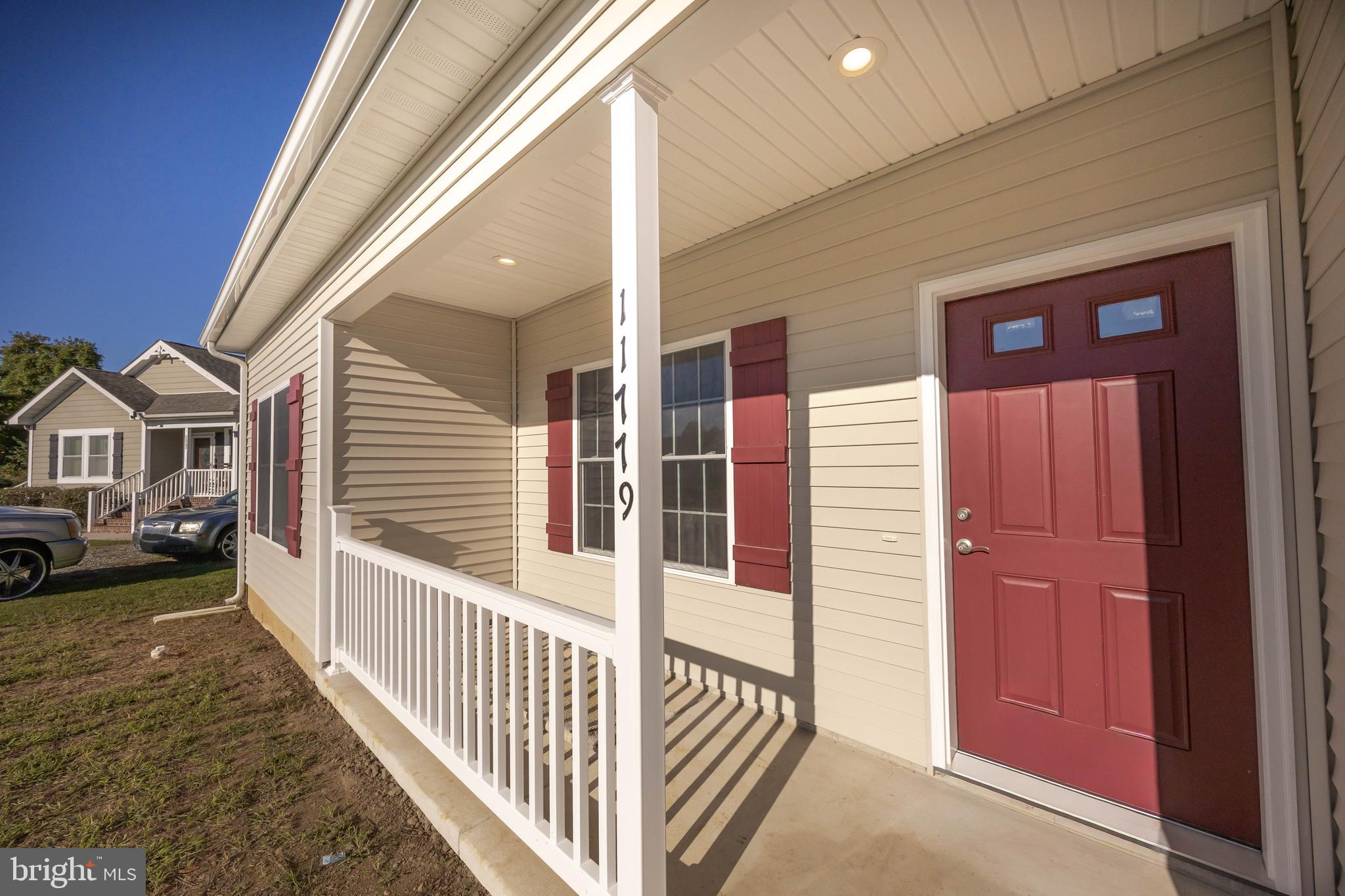 11779 St Stephens Way Princess Anne, MD 21853 - Photo 5 of 51 a view of a house with a porch