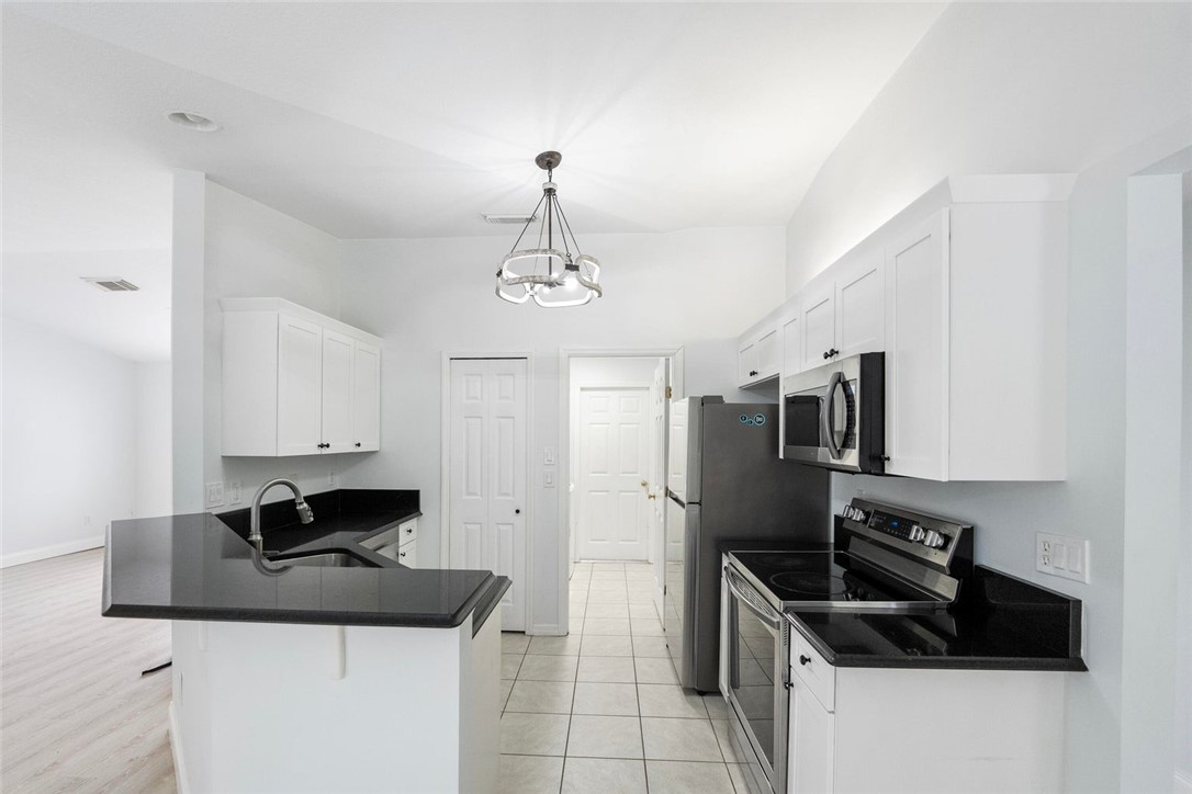 2261 Southeast Merrill Road Port St. Lucie, FL 34952 - Photo 12 of 24 Gallery Image 12