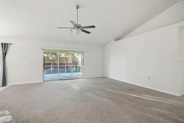 a view of a livingroom with a ceiling fan