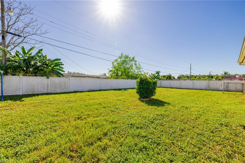 339 Beachwood Road Lehigh Acres, FL 33936 - Photo 28 of 32 View of fenced backyard