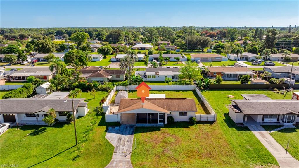 339 Beachwood Road Lehigh Acres, FL 33936 - Photo 31 of 32 Aerial view of residential area