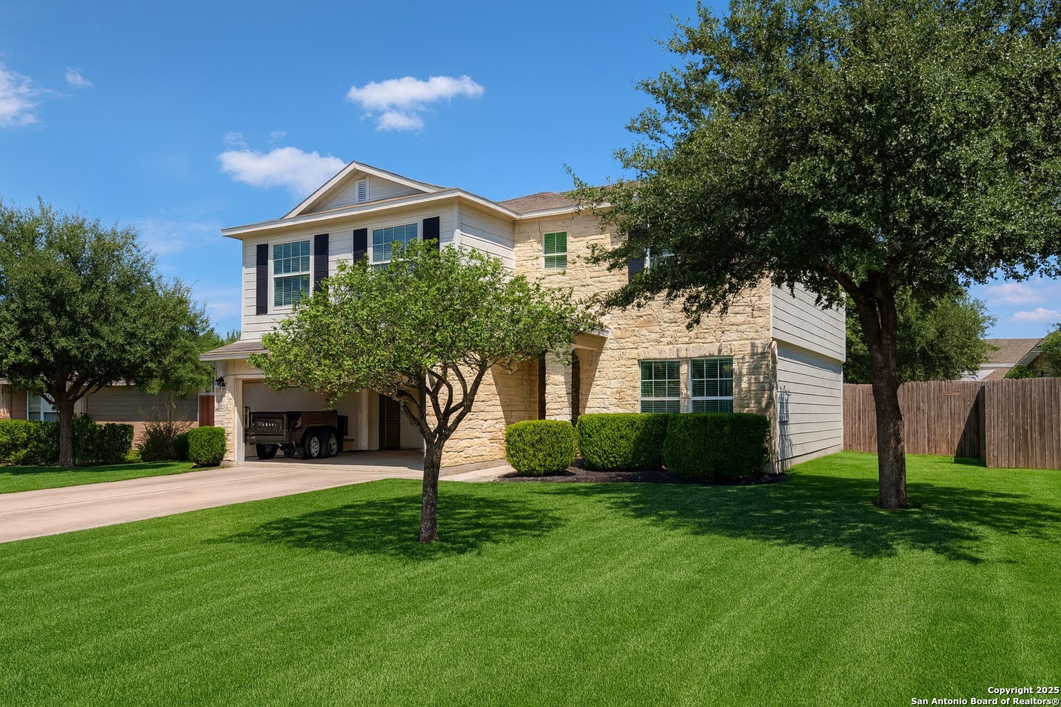 3632 Double Diamond Schertz, TX 78154 - Photo 3 of 10 a front view of a house with a yard and green space