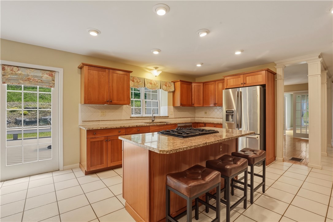 3200 Goff Road Corning, NY 14830 - Photo 13 of 50 The kitchen has cherry cabinets, granite counters,