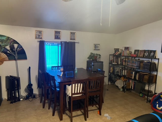 900 East Rankin Road, Unit 5 Tulare, CA 93274 - Photo 8 of 26 a view of a dining room with furniture