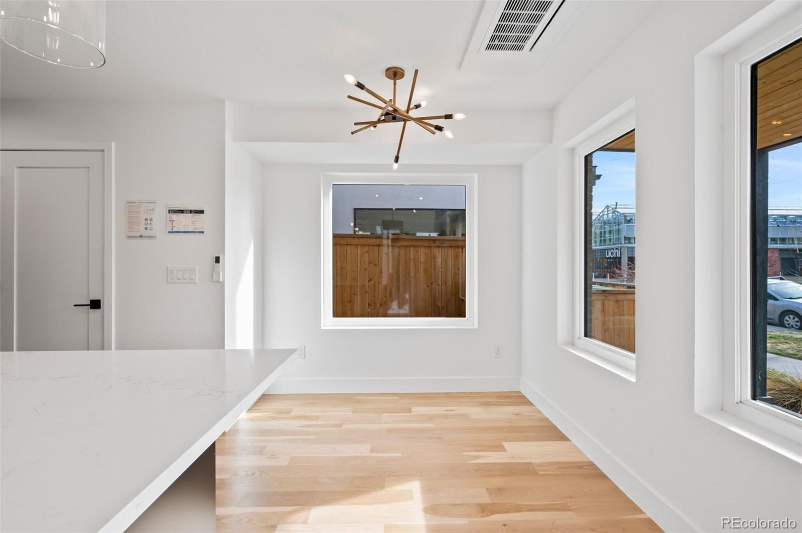 2453 Lawrence Street, Unit 1 Denver, CO 80205 - Photo 8 of 48 a view of an empty room with a window