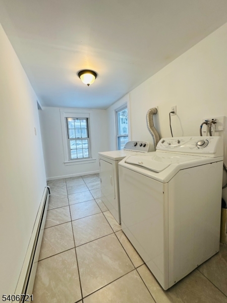 22 Harrison Street Sussex, NJ 07461 - Photo 11 of 23 a utility room with dryer and washer
