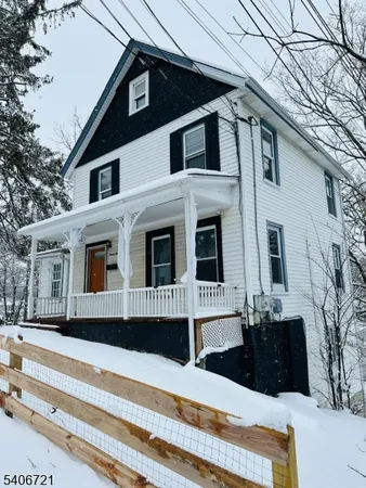 a view of a house with a large window