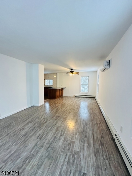 22 Harrison Street Sussex, NJ 07461 - Photo 9 of 23 a view of empty room with wooden floor