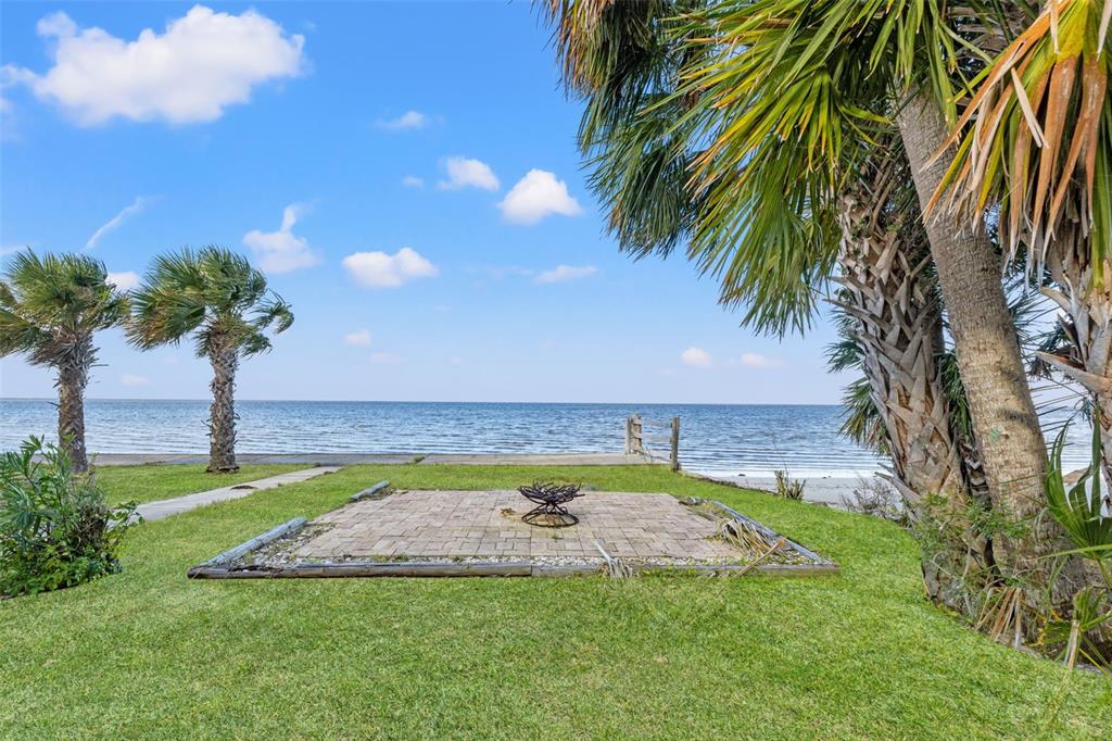 3461 Gum Drive Weeki Wachee, FL 34607 - Photo 17 of 48 a view of a swimming pool with a yard