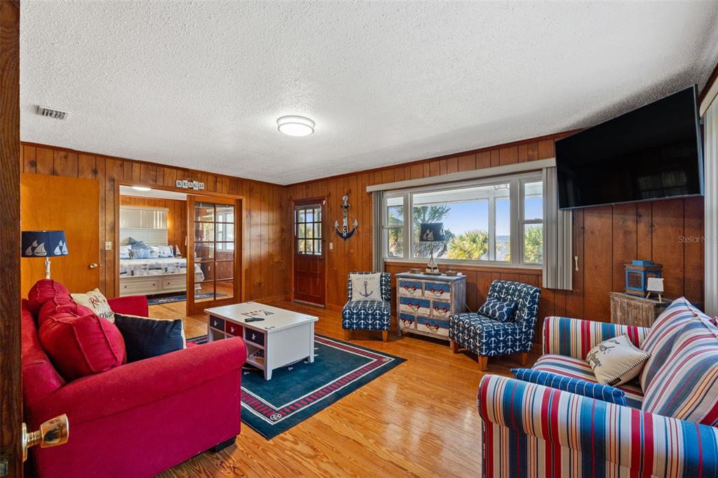 3461 Gum Drive Weeki Wachee, FL 34607 - Photo 20 of 48 a living room with furniture and a flat screen tv