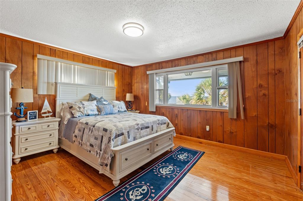 3461 Gum Drive Weeki Wachee, FL 34607 - Photo 23 of 48 a bedroom with a large bed and a window