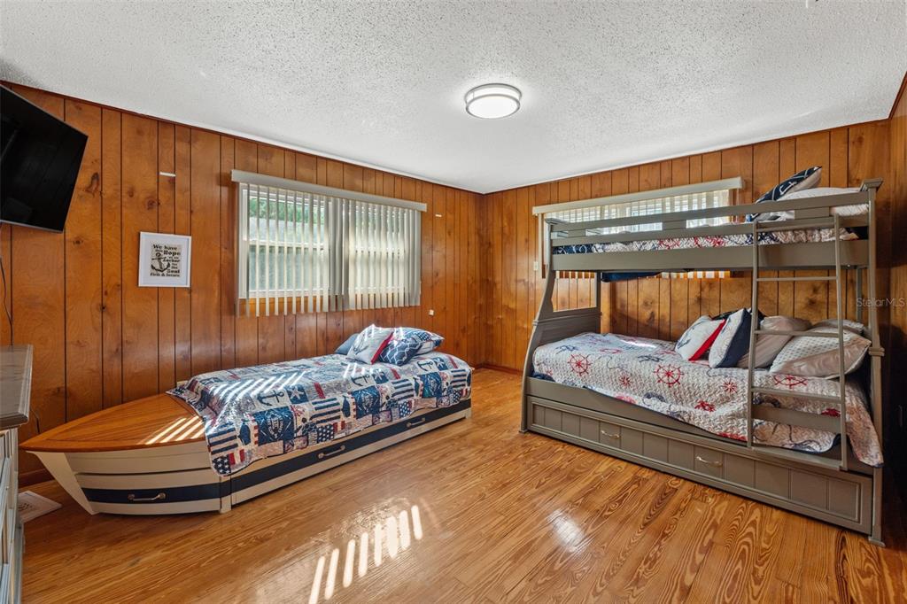 3461 Gum Drive Weeki Wachee, FL 34607 - Photo 28 of 48 a bedroom with bed and window