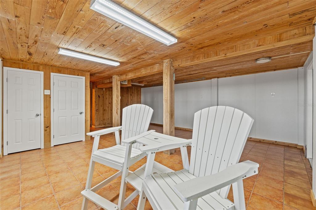 3461 Gum Drive Weeki Wachee, FL 34607 - Photo 33 of 48 a view of a room with table and chairs