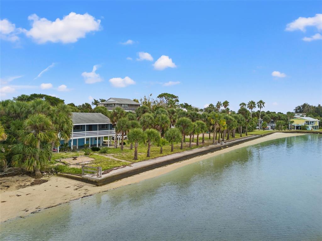 3461 Gum Drive Weeki Wachee, FL 34607 - Photo 44 of 48 a view of a lake with a houses