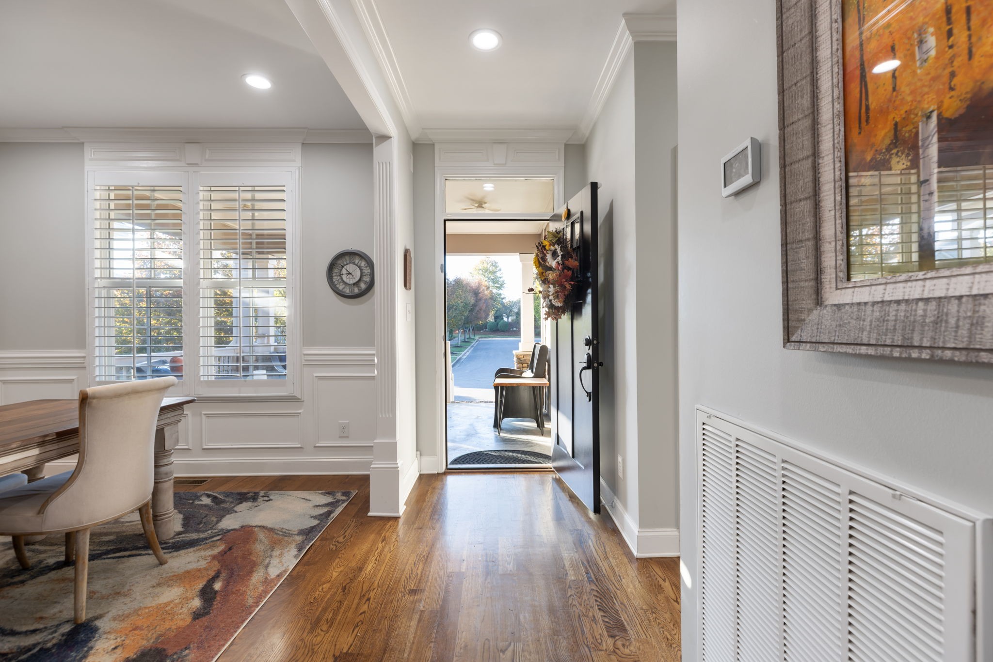 4120 Turnberry Road Spring Hill, TN 37174 - Photo 11 of 48 a view of a hallway with wooden floor and dining room view