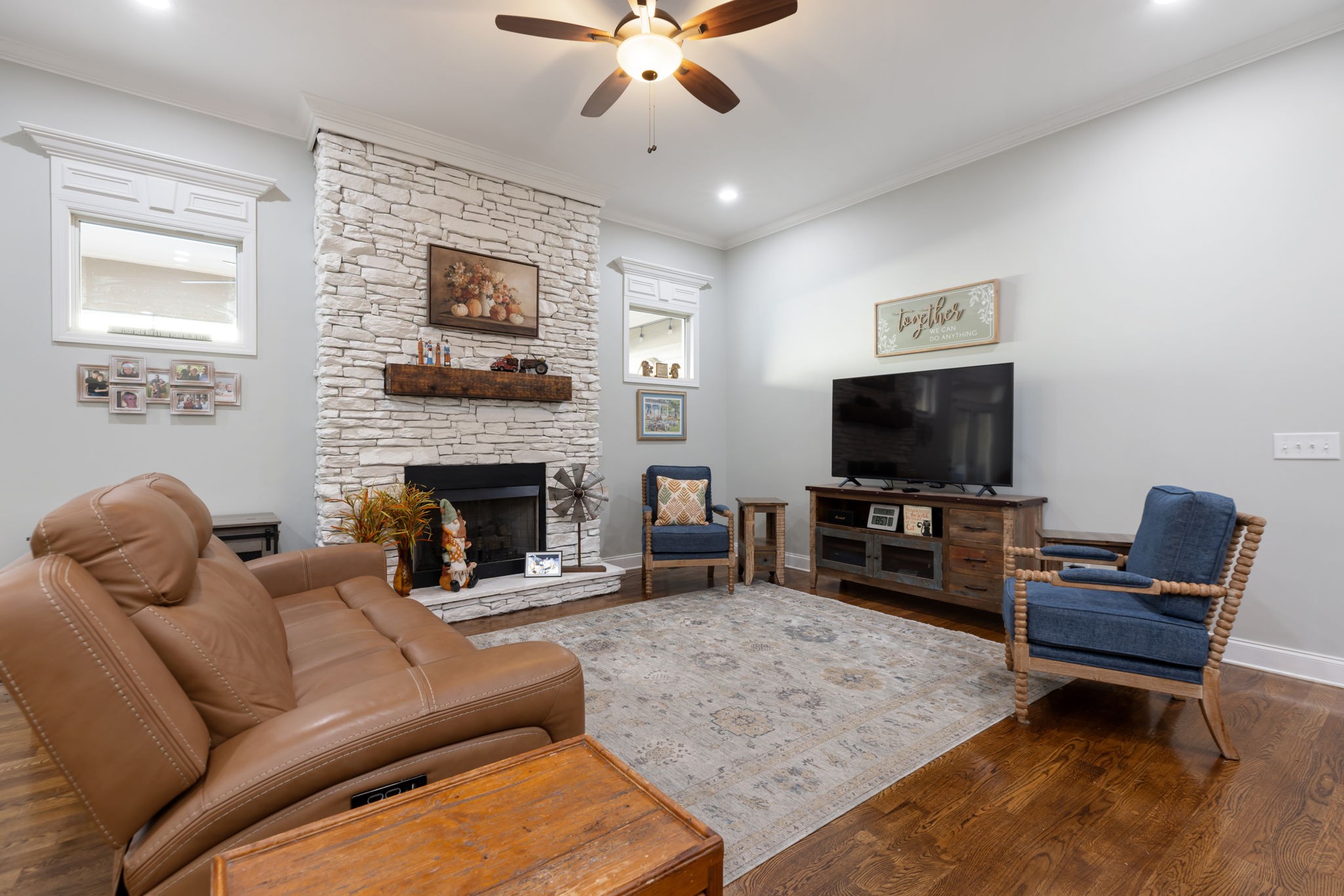 4120 Turnberry Road Spring Hill, TN 37174 - Photo 16 of 48 a living room with furniture and a flat screen tv