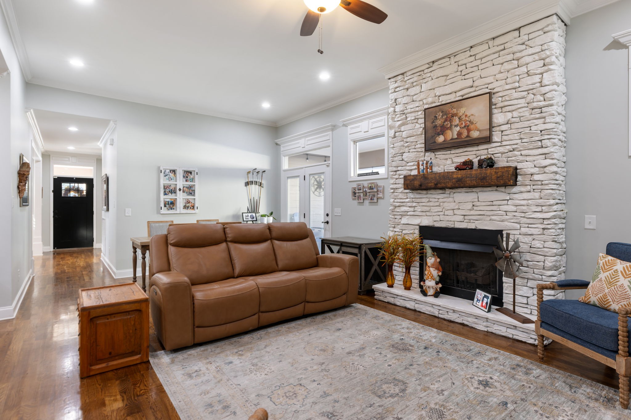 4120 Turnberry Road Spring Hill, TN 37174 - Photo 19 of 48 a living room with furniture and a fireplace