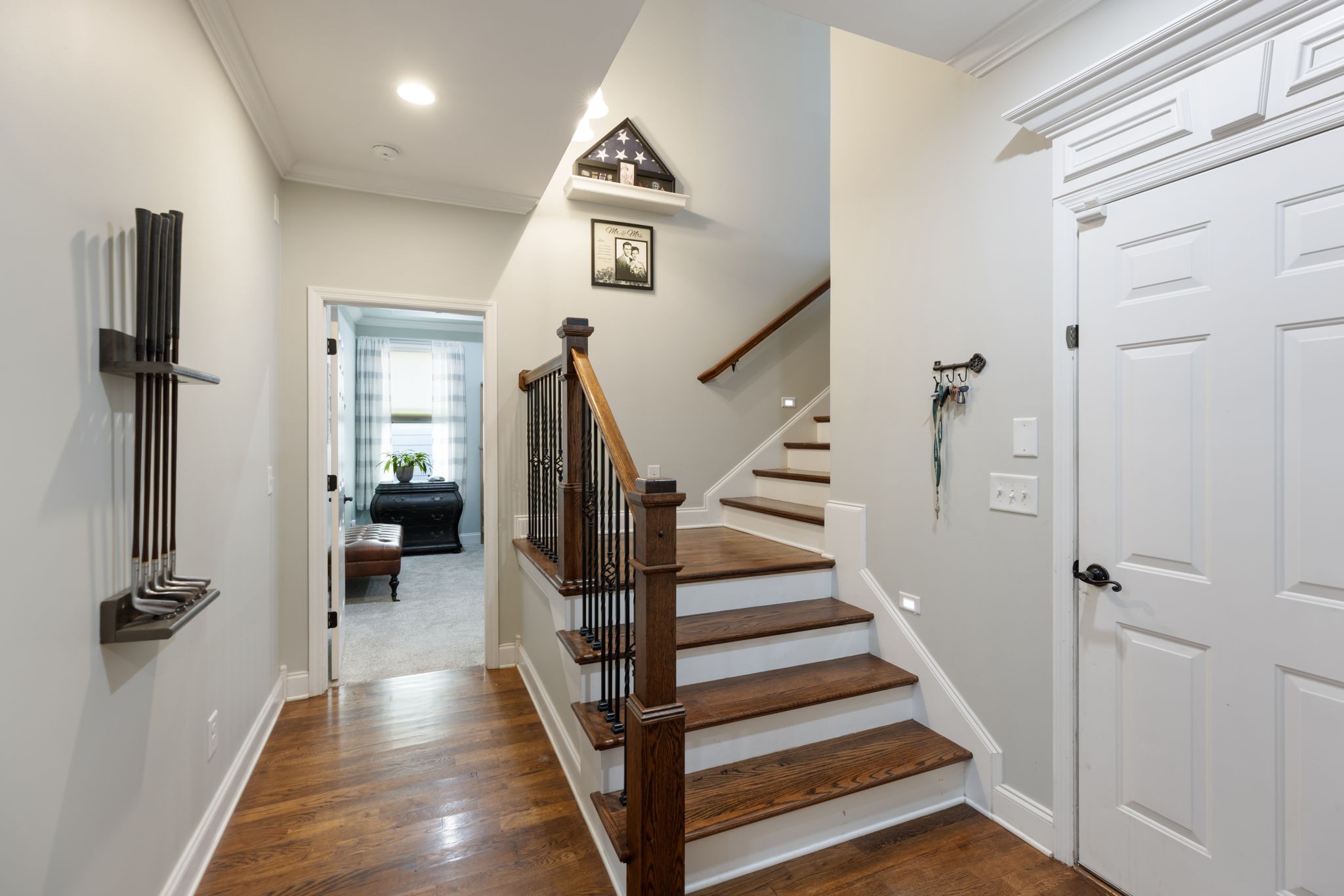 4120 Turnberry Road Spring Hill, TN 37174 - Photo 29 of 48 a view of a hallway with entryway wooden floor and stairs