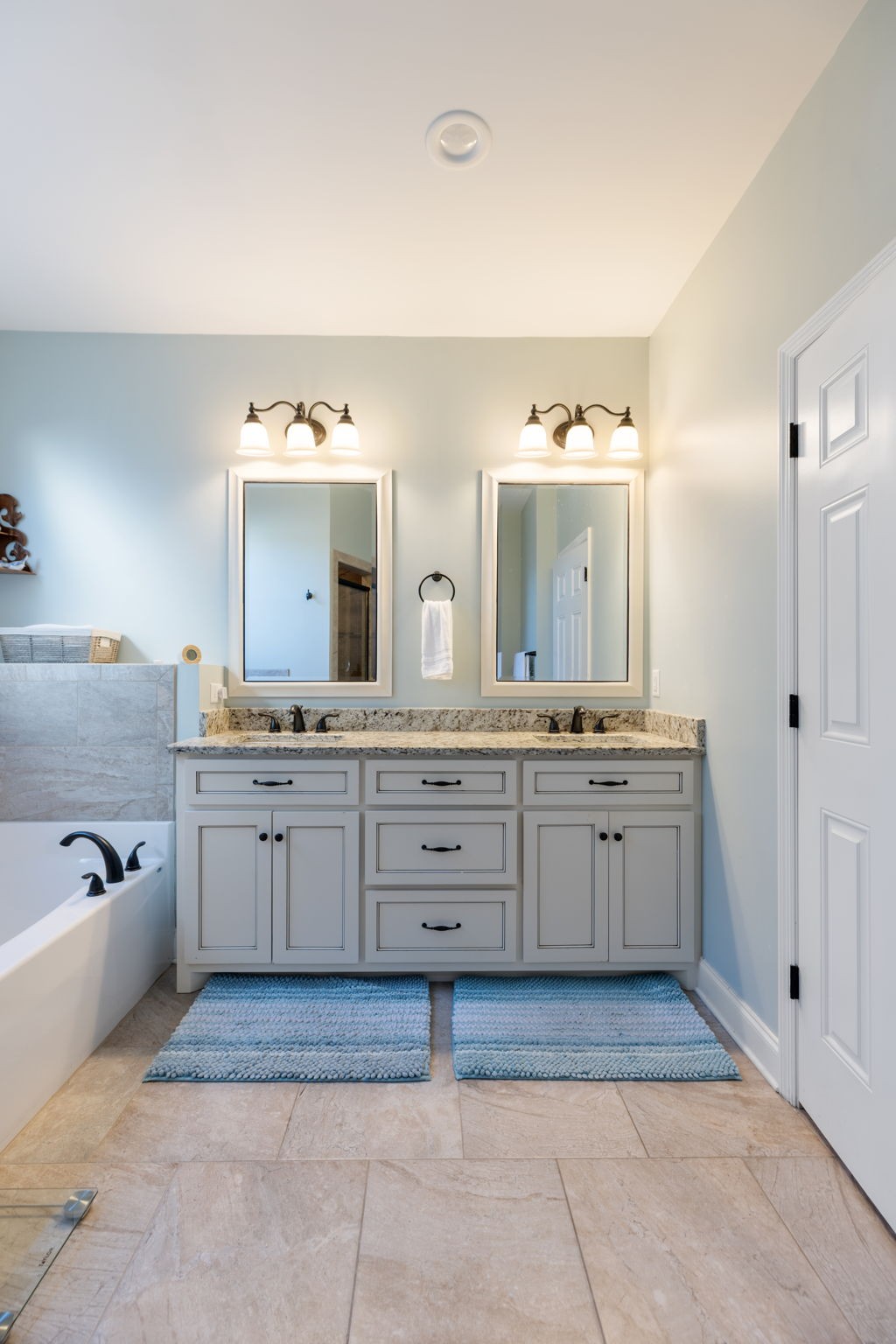 4120 Turnberry Road Spring Hill, TN 37174 - Photo 37 of 48 a spacious bathroom with a granite countertop sink mirror and bathtub