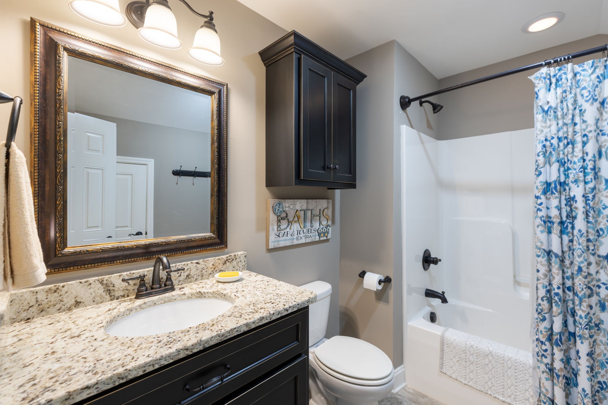 4120 Turnberry Road Spring Hill, TN 37174 - Photo 41 of 48 a bathroom with a granite countertop sink toilet and shower