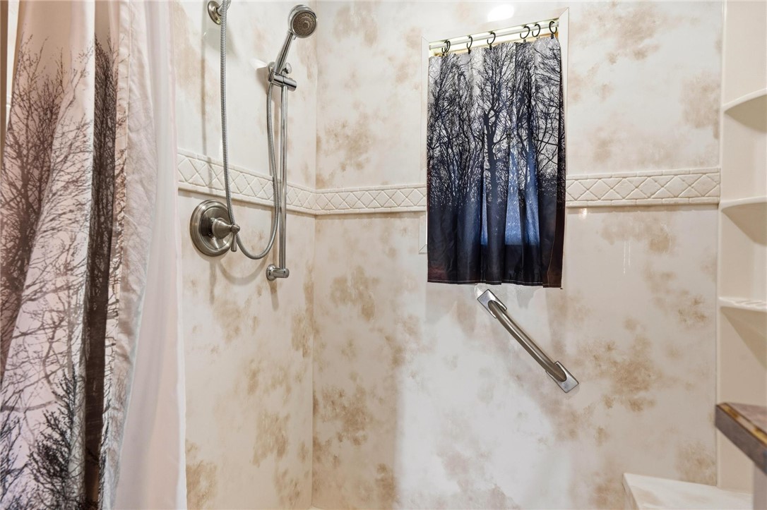 4971 Lackey Road Cedarville, OH 45314 - Photo 64 of 79 This bathroom features a shower with functional design elements and practical shelving.