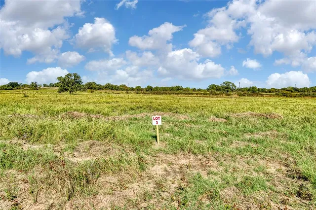 a sign that is on the brick walls