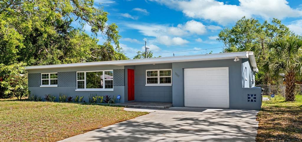 front view of a house with a yard