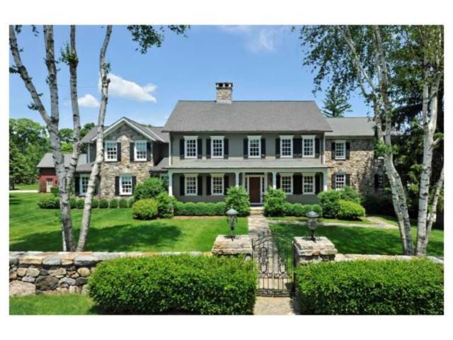 27 Hoyclo Road Stamford, CT 06903 - Photo 1 of 1 a front view of a house with a yard