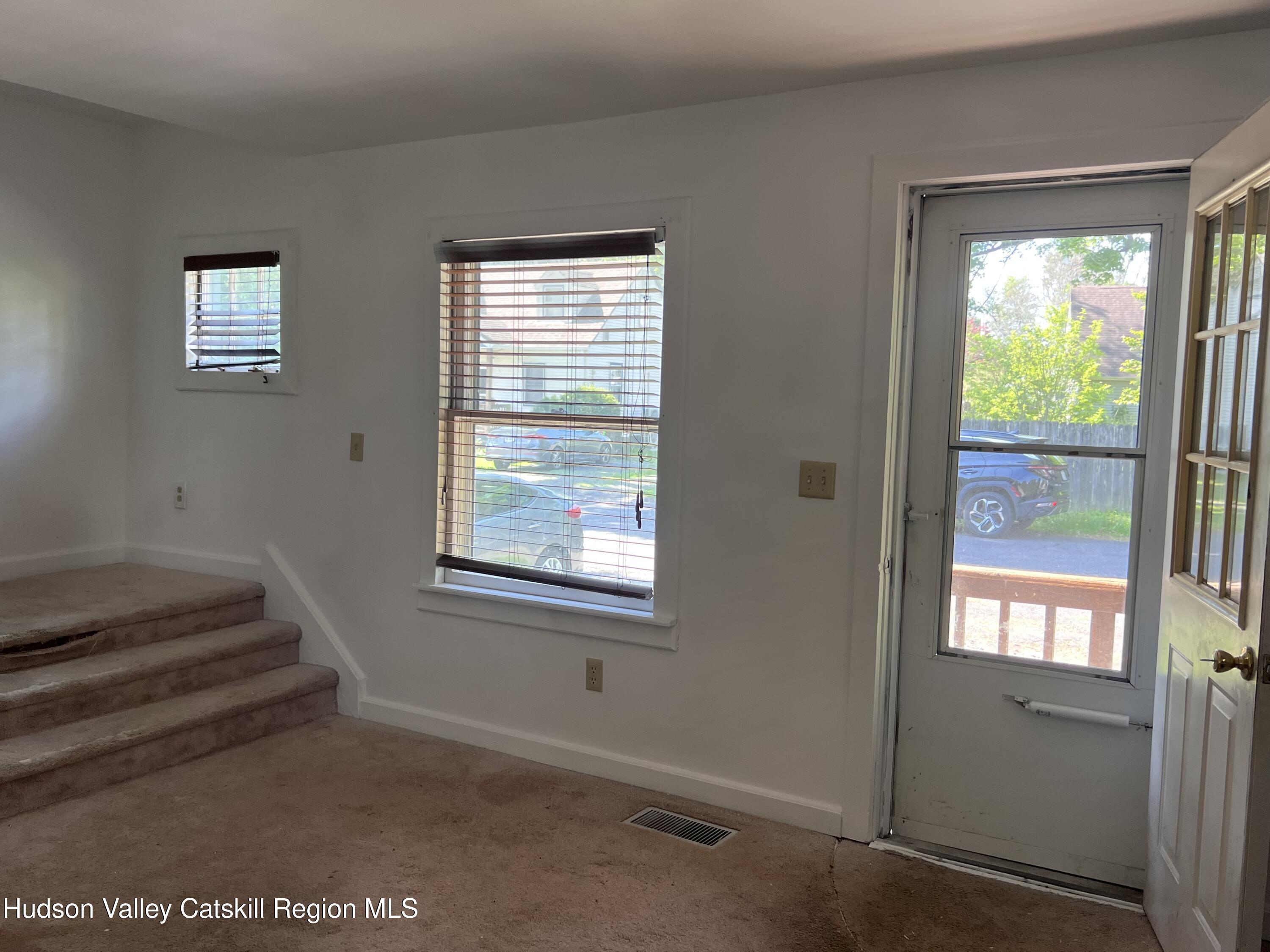7 Berry Street Wallkill, NY 12589 - Photo 6 of 7 a view of an empty room with a window