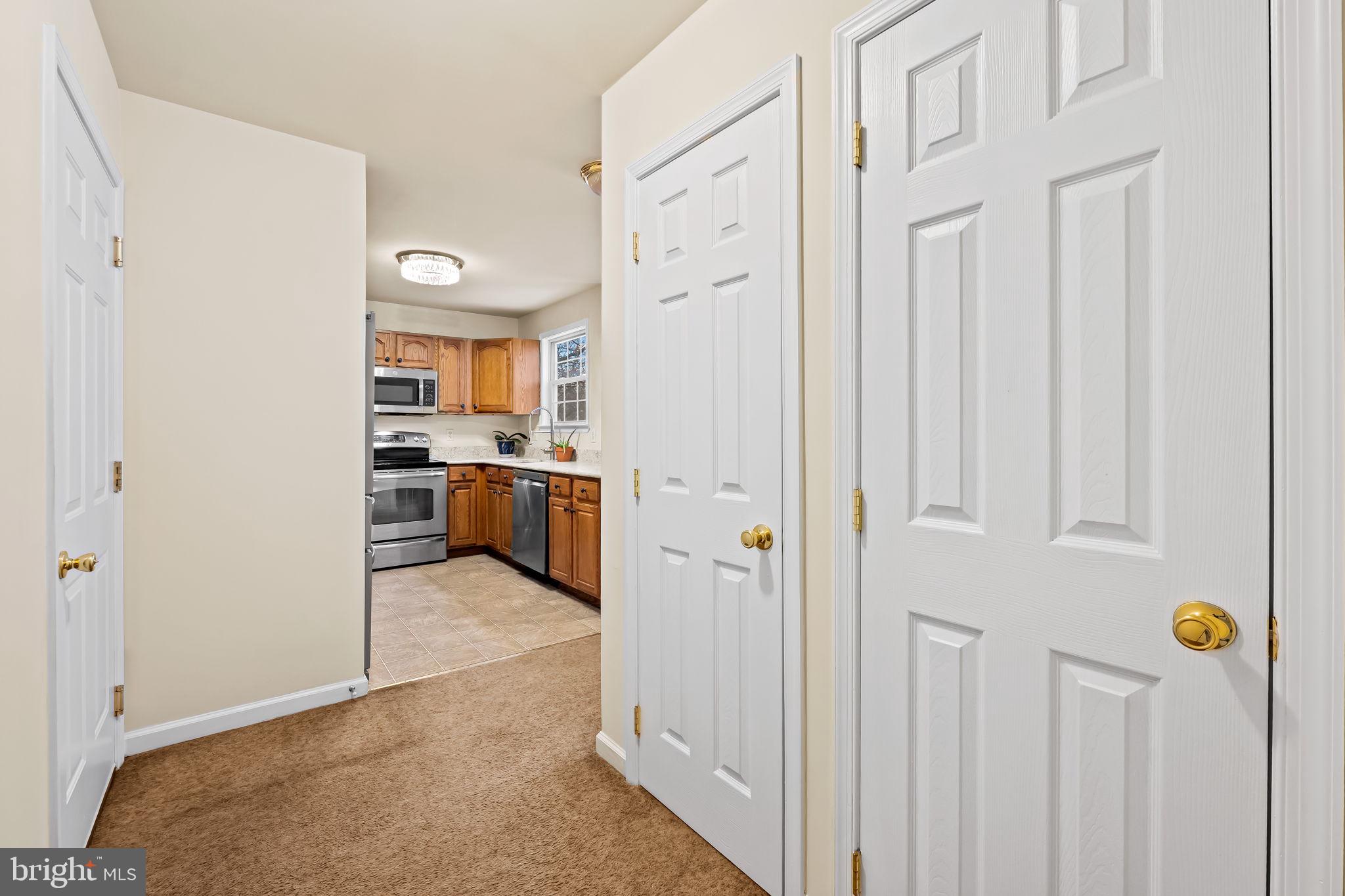 1564 Colony Road Pasadena, MD 21122 - Photo 27 of 40 hall with storage