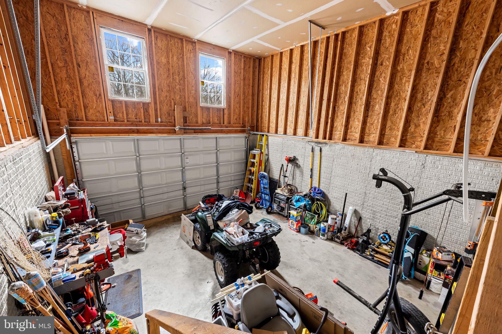 1564 Colony Road Pasadena, MD 21122 - Photo 28 of 40 Garage with 20 foot plus ceiling