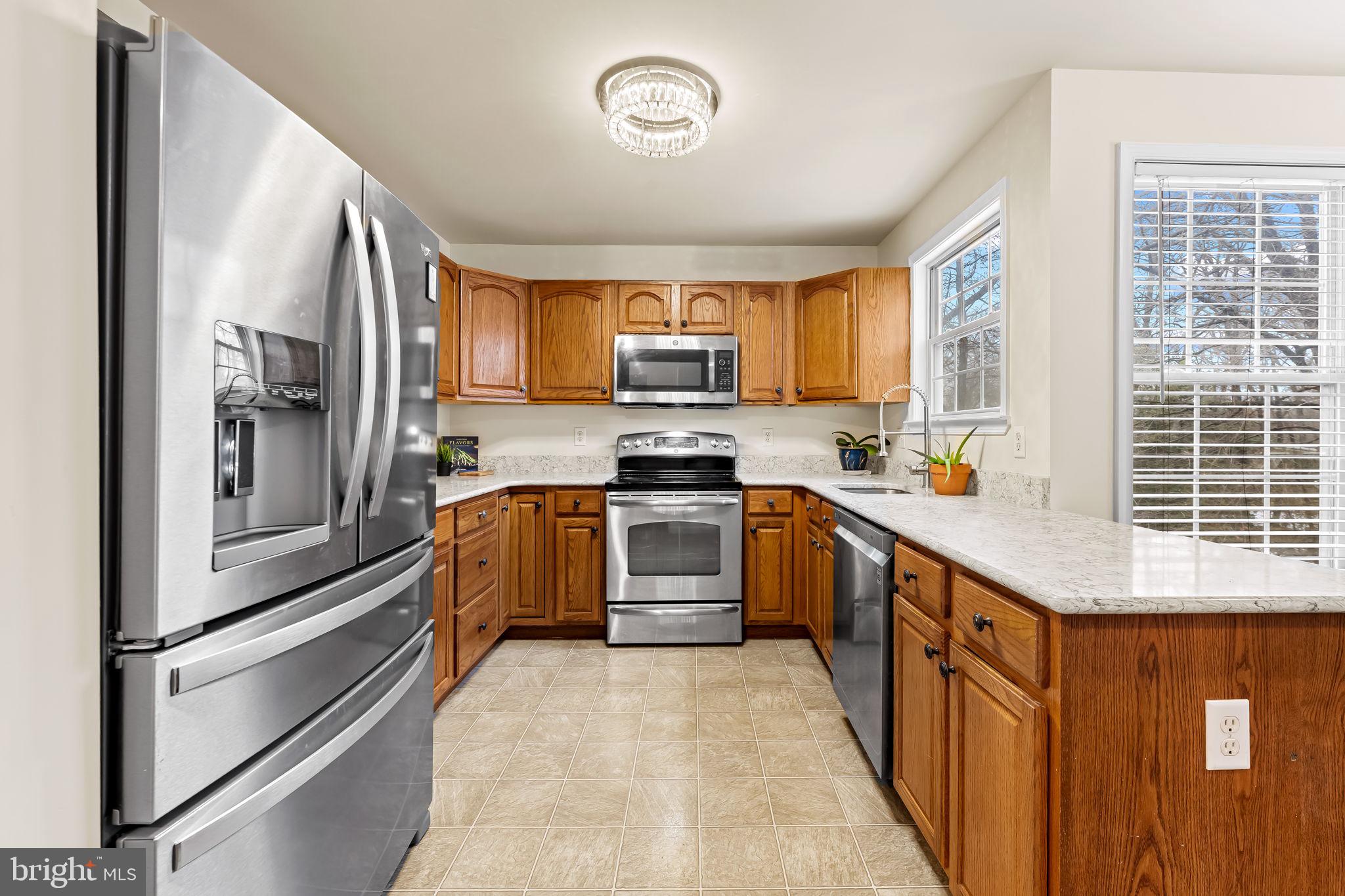 1564 Colony Road Pasadena, MD 21122 - Photo 9 of 40 Kitchen with SS appliances