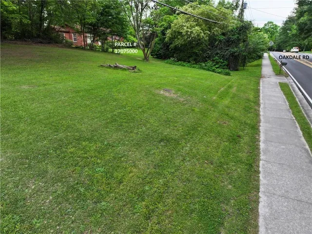 a view of a table and chairs under an umbrella
