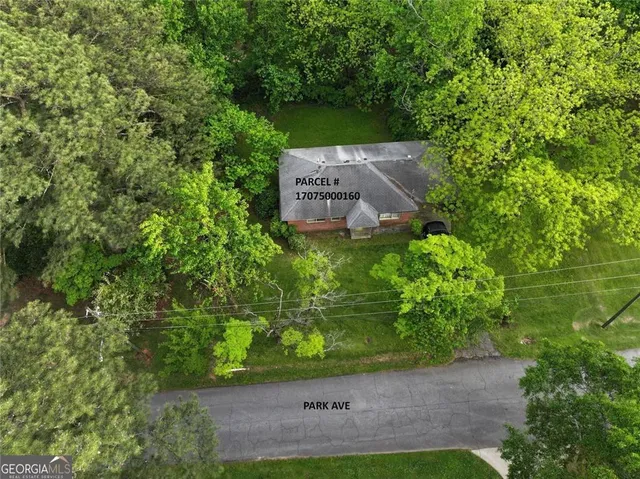 a view of a backyard with a garden