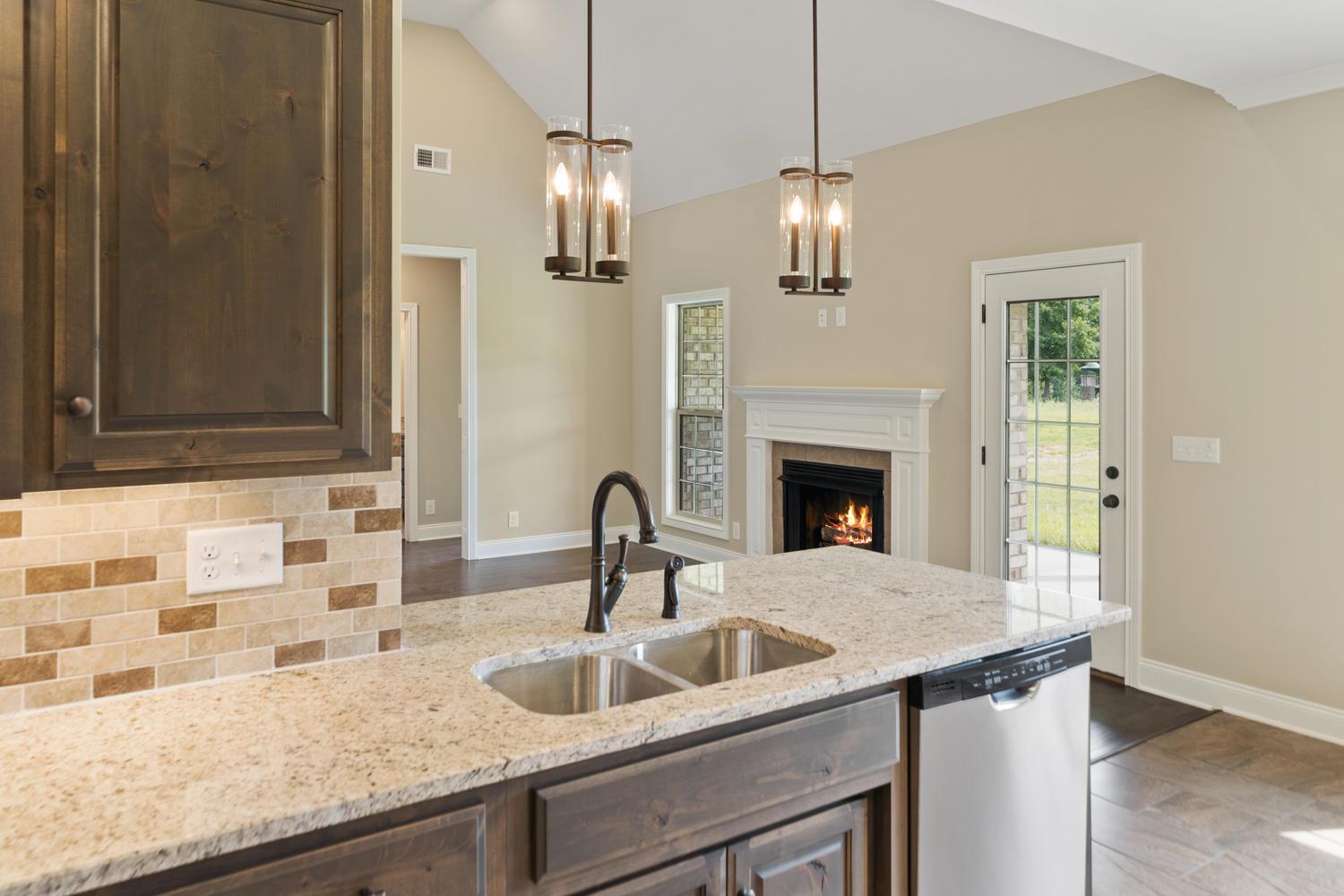 4347 Memory Lane Adams, TN 37010 - Photo 11 of 30 a kitchen with a sink and a refrigerator