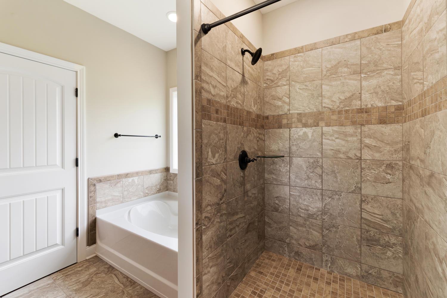 4347 Memory Lane Adams, TN 37010 - Photo 17 of 30 a bathroom with a bath tub