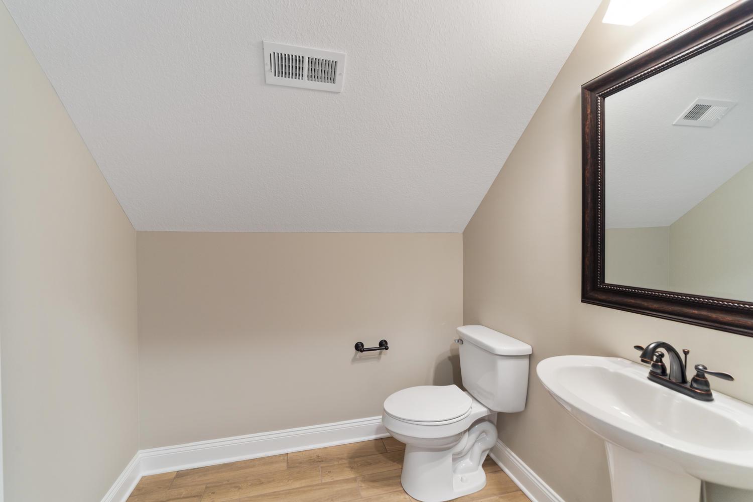 4347 Memory Lane Adams, TN 37010 - Photo 20 of 30 a bathroom with a sink and a toilet