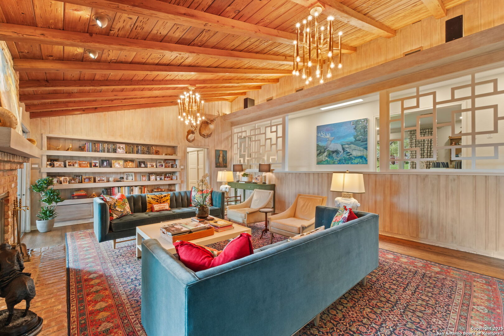 701 Ridgemont Avenue Terrell Hills, TX 78209 - Photo 15 of 48 a living room with furniture and a chandelier