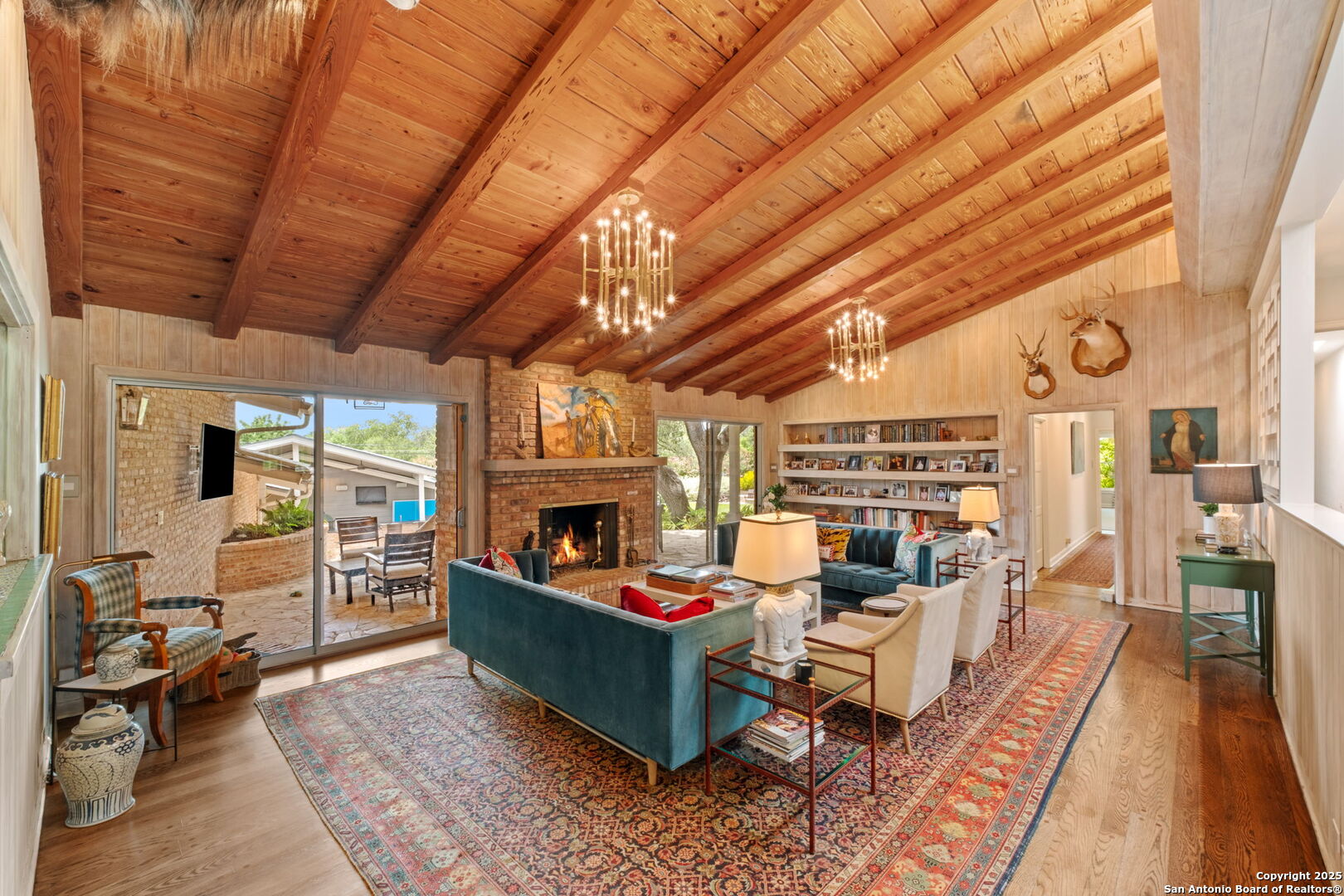 701 Ridgemont Avenue Terrell Hills, TX 78209 - Photo 16 of 48 a living room with furniture a fireplace and a table
