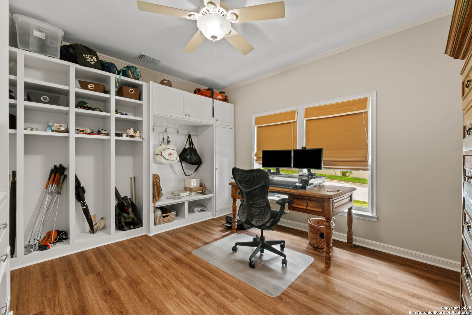 701 Ridgemont Avenue Terrell Hills, TX 78209 - Photo 35 of 48 a view of a workspace with furniture and a window