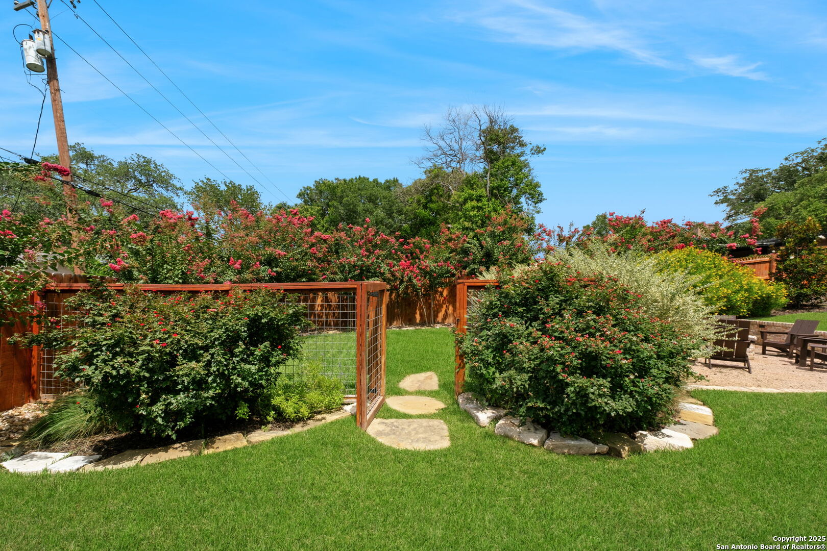 701 Ridgemont Avenue Terrell Hills, TX 78209 - Photo 43 of 48 a view of a garden with a building in the background