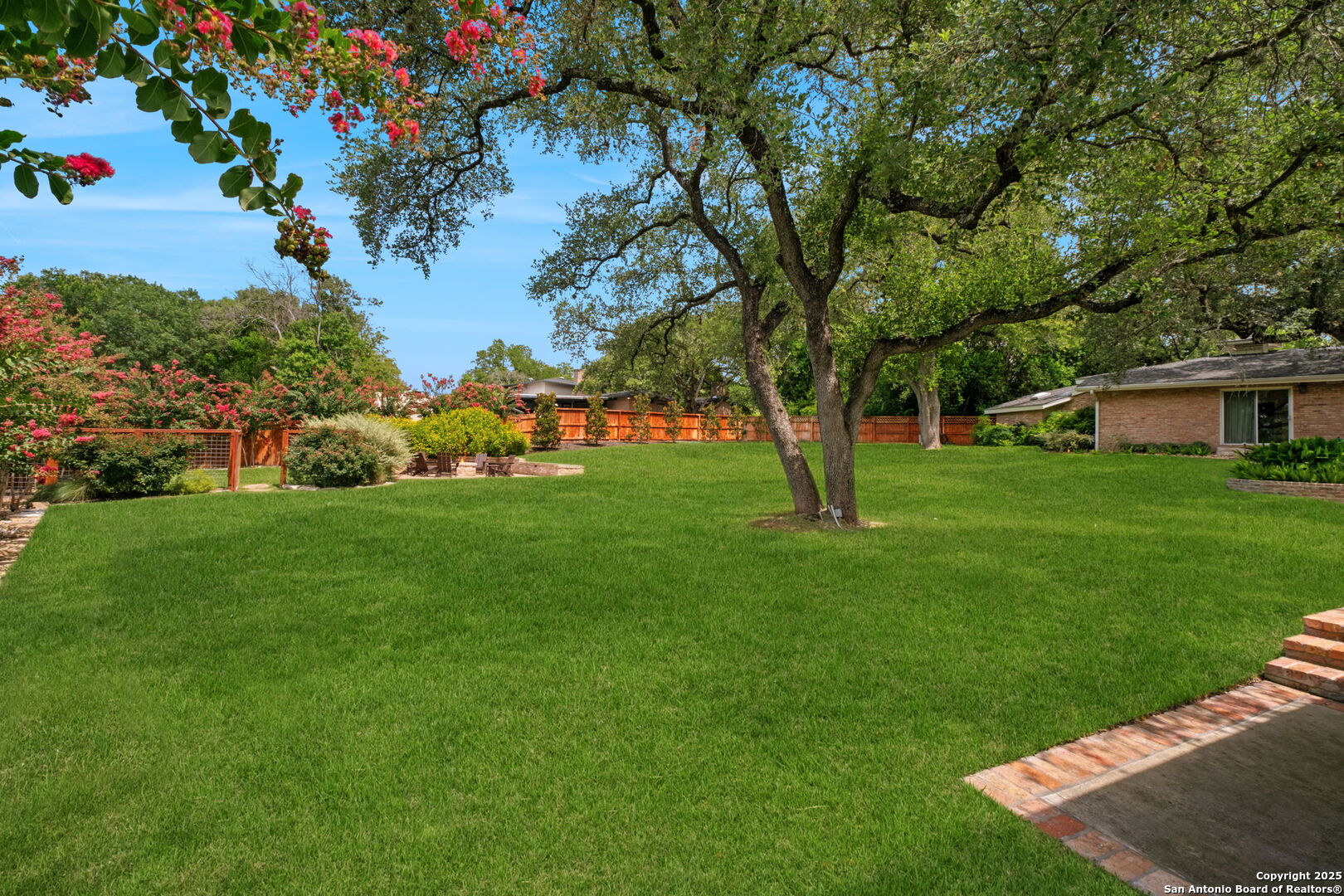 701 Ridgemont Avenue Terrell Hills, TX 78209 - Photo 47 of 48 a view of an house with backyard space and garden