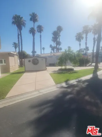 a view of a house with a swimming pool