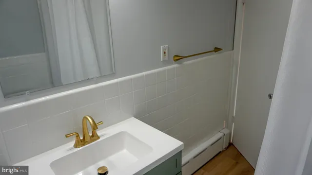 a bathroom with a sink and a vanity