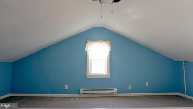 a view of a window in an empty room