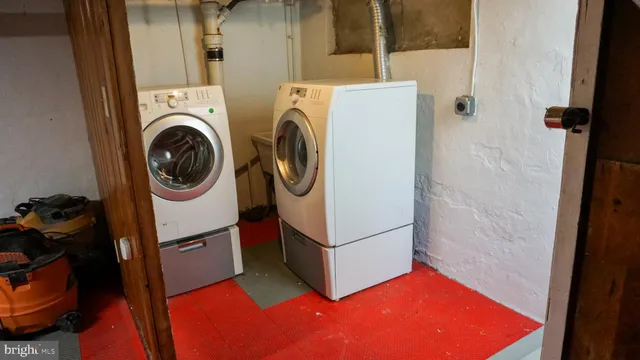 a utility room with dryer and washer