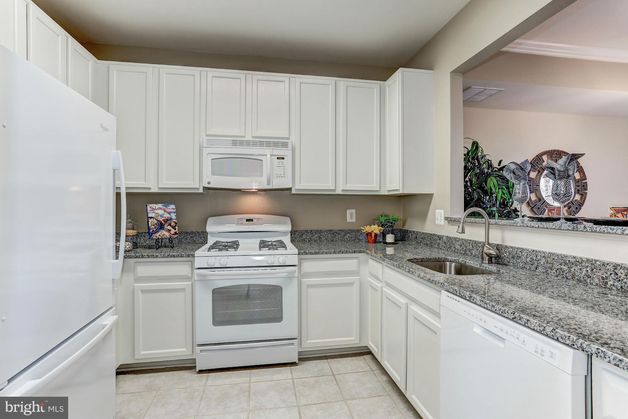 1305 Windleaf Drive, Unit 166 Reston, VA 20194 - Photo 9 of 21 Kitchen